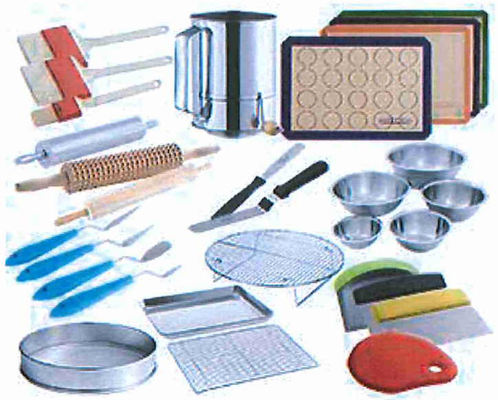 A variety of baking supplies are arranged on the table.